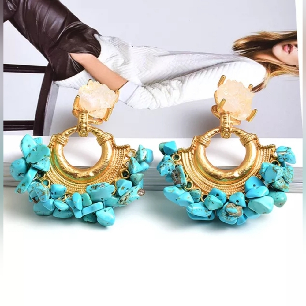These are unique peices of Gold plated earrings with coral beads.